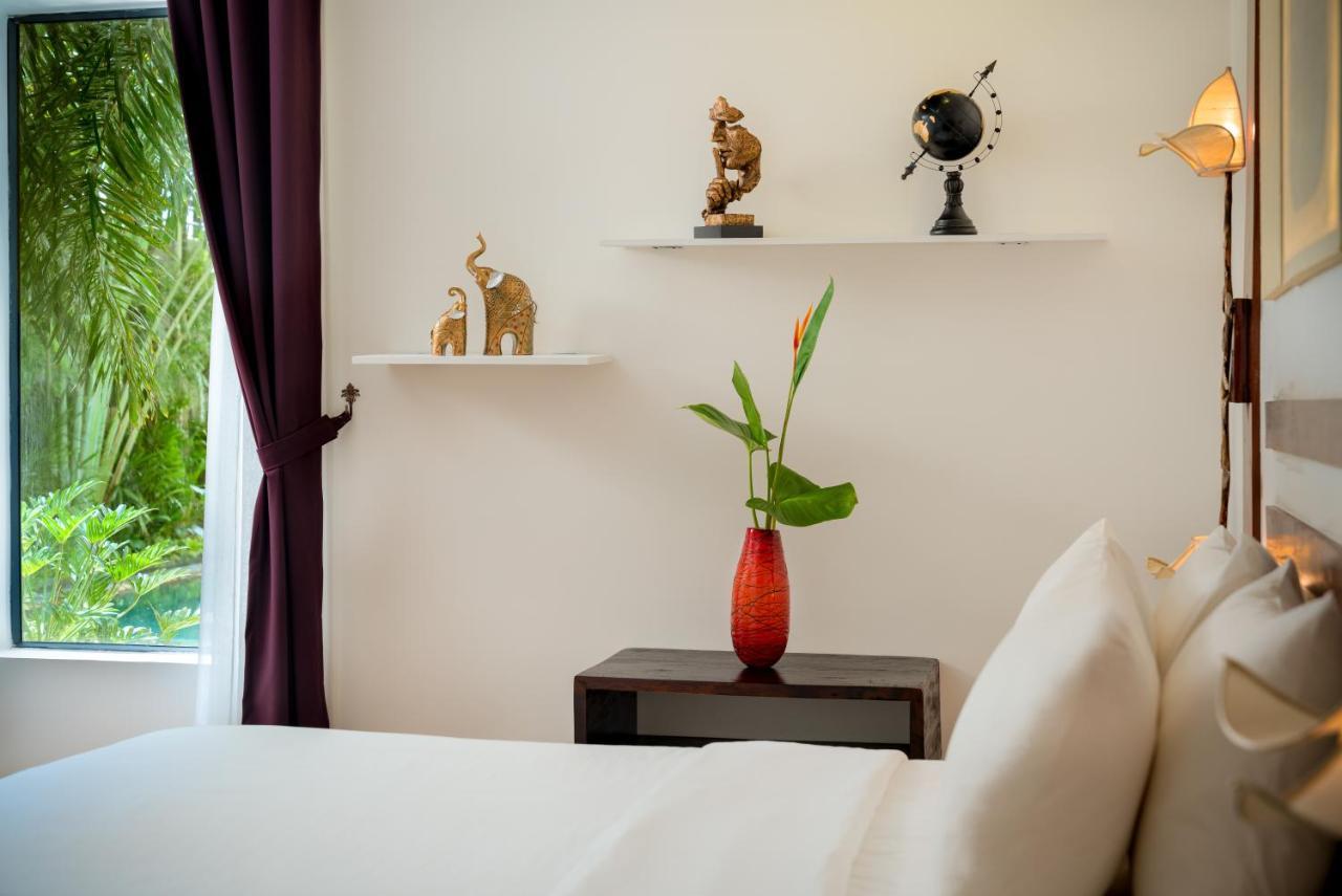 The Thirdfold Residence Ciudad de Siem Riep Exterior foto A bedroom at the hotel